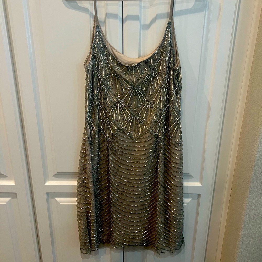 Beautiful beaded dress. Champagne color with stones and pearls.